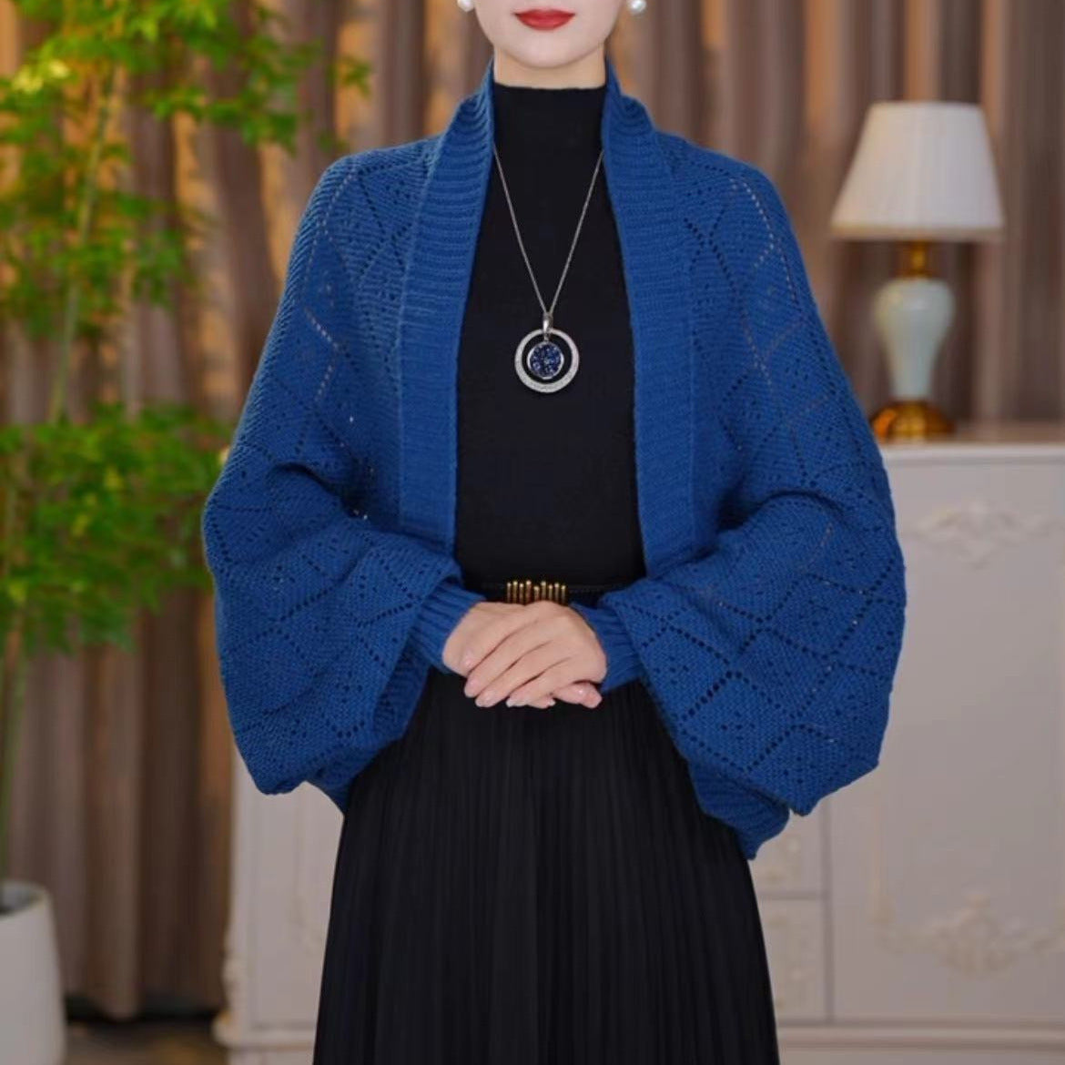 Mode ausgehöhlte Strickjacke