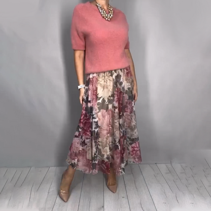 Elegante completo due pezzi composto da top in maglia floreale e gonna midi
