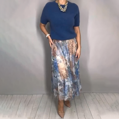 Elegante completo due pezzi composto da top in maglia floreale e gonna midi