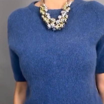 Elegante completo due pezzi composto da top in maglia floreale e gonna midi