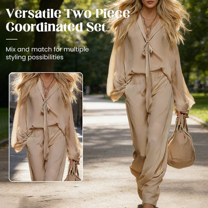 Elegante completo a due pezzi da donna composto da camicetta con scollo a V e pantaloni