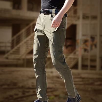 🔥👖 Sconto del 60%! Pantaloni tattici elasticizzati multifunzionali: tasche con cerniera, vestibilità slim e tessuto elasticizzato per una totale libertà di movimento.