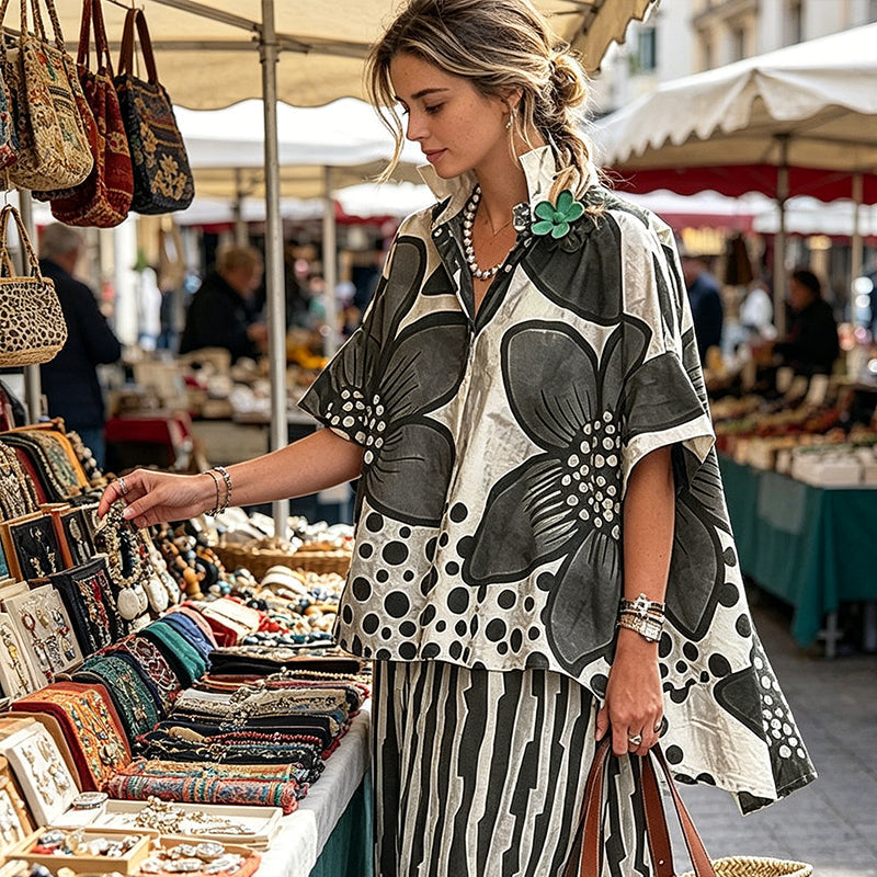 Completo da donna a due pezzi: top stampato e pantaloni abbinati.