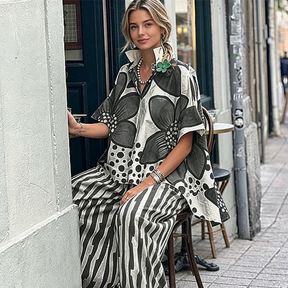 Completo da donna a due pezzi: top stampato e pantaloni abbinati.