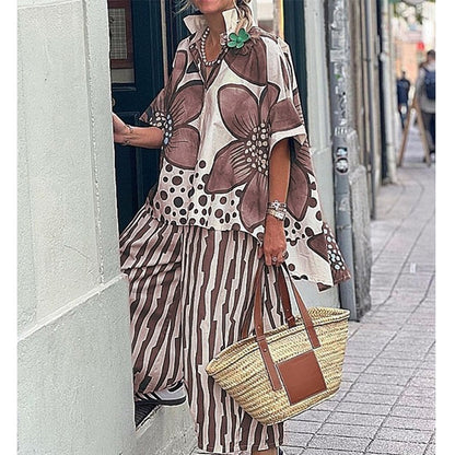 Completo da donna a due pezzi: top stampato e pantaloni abbinati.