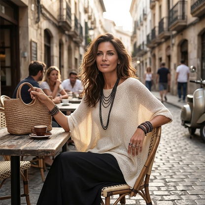Top in maglia da donna con maniche a pipistrello traforate
